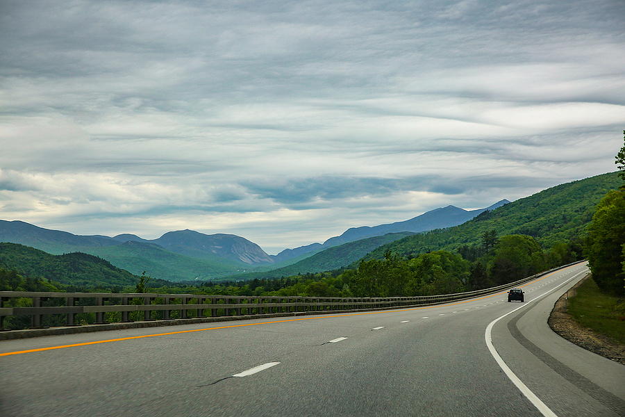 Road At The Mountains.  Road Trip. Copy Space For Your Text